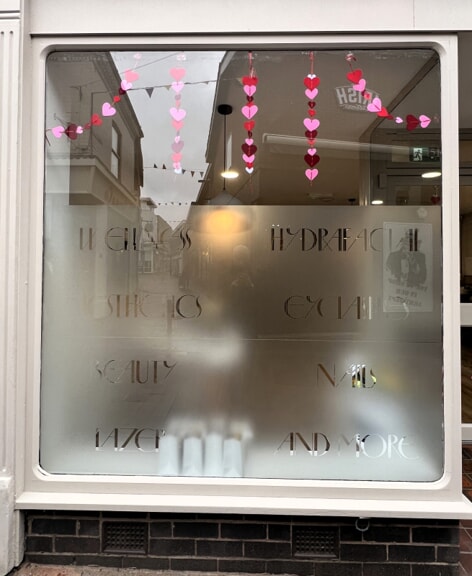 Lumi SKN Clinics window graphics